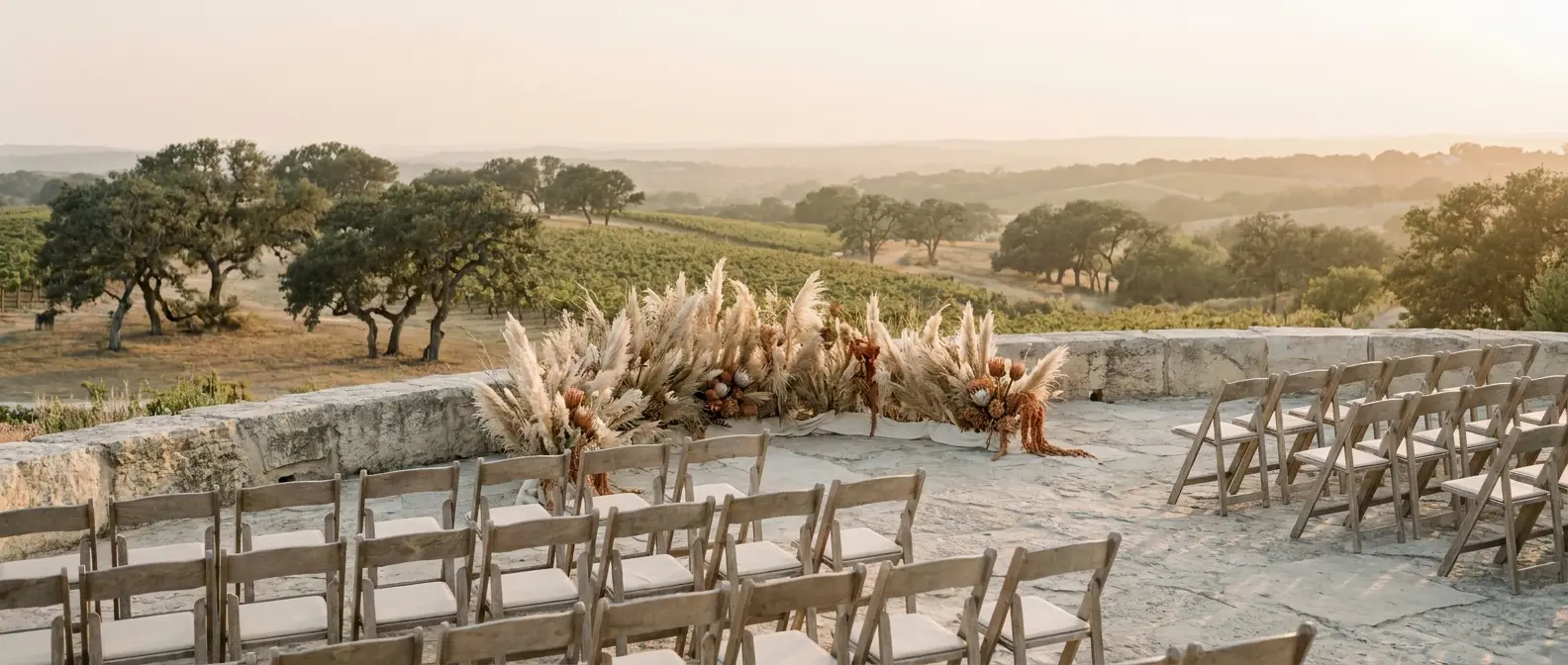 The Texas Hill Country at golden hour, limestone ridges and live oaks receding toward the distant Austin skyline.